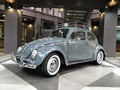 Grey Volkswagen VW beetle classic car on display atÃÂ showroom parked. Royalty Free Stock Photo